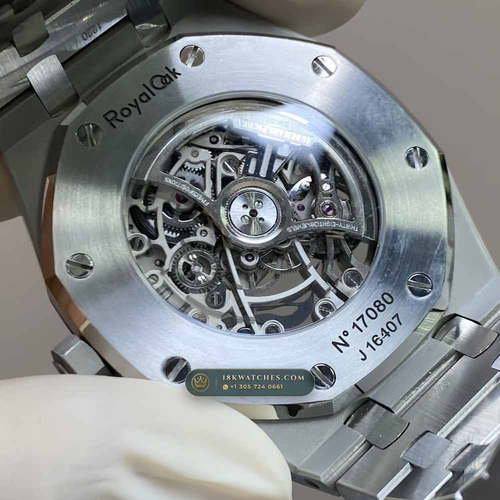 Audemars Piguet Royal Oak Double Balance Wheel Openworked 41mm Baguette Blue Topaz Bezel 18K White Gold Free-Sprung Calibre Ref. 15412BC.TO.1220BC.01 — Studio Gallery Plate IV in 18K White Gold Au750 (224.5g Verified Mass, Audemars Piguet Cal. 3132 Dual-Balance Openworked)