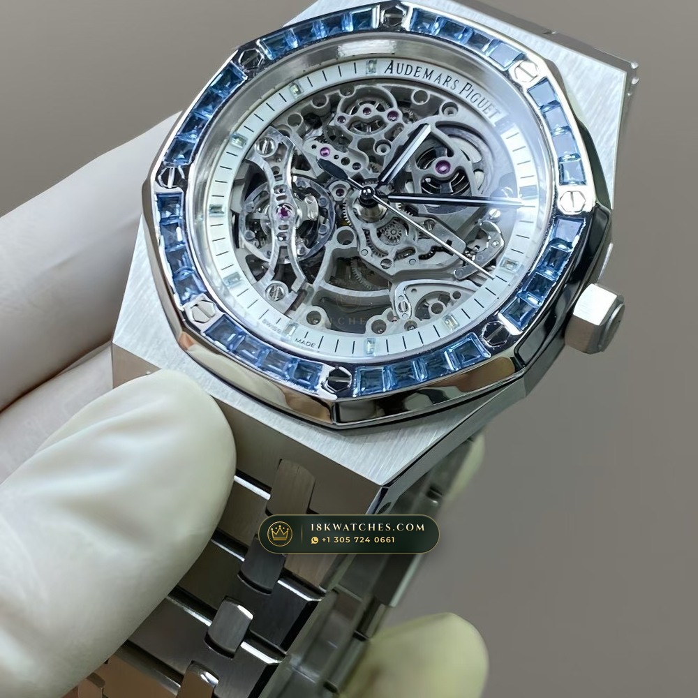 Audemars Piguet Royal Oak Double Balance Wheel Openworked 41mm Baguette Blue Topaz Bezel 18K White Gold Free-Sprung Calibre Ref. 15412BC.TO.1220BC.01 — Studio Gallery Plate VII in 18K White Gold Au750 (224.5g Verified Mass, Audemars Piguet Cal. 3132 Dual-Balance Openworked)