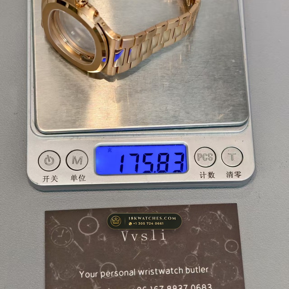 Patek Philippe Nautilus Moonphase & Power Reserve 18K Rose Gold Chronometer Regulated Spec Ref. 5712/1R-001 — Studio Gallery Plate X in 18K Rose Gold Au750 (186.6g Verified Mass, Patek Philippe Cal. 240 PS IRM C LU - 22K Gold Micro-Rotor)
