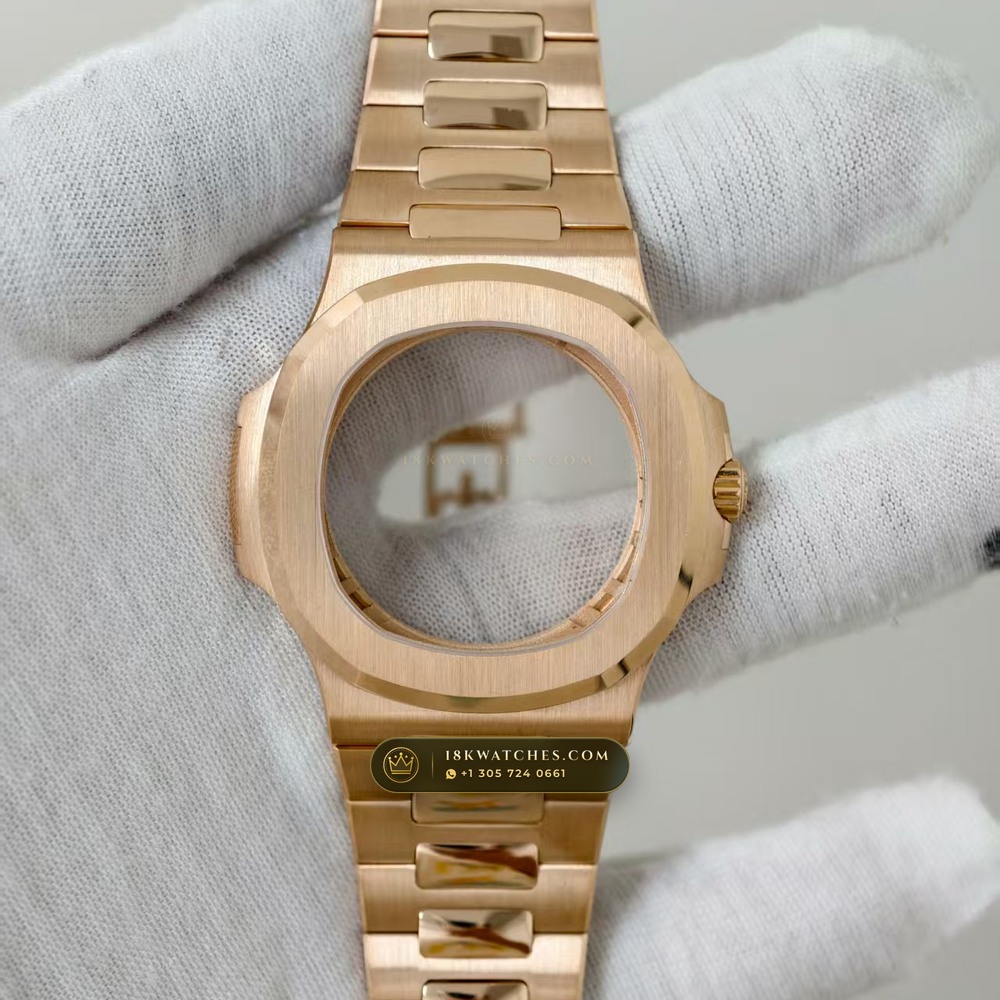 Patek Philippe Nautilus Moonphase & Power Reserve 18K Rose Gold Chronometer Regulated Spec Ref. 5712/1R-001