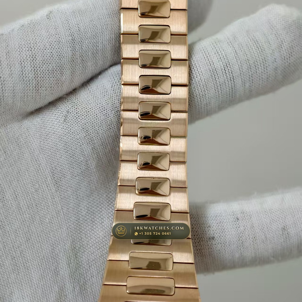 Patek Philippe Nautilus Moonphase & Power Reserve 18K Rose Gold Chronometer Regulated Spec Ref. 5712/1R-001 — Studio Gallery Plate III in 18K Rose Gold Au750 (186.6g Verified Mass, Patek Philippe Cal. 240 PS IRM C LU - 22K Gold Micro-Rotor)