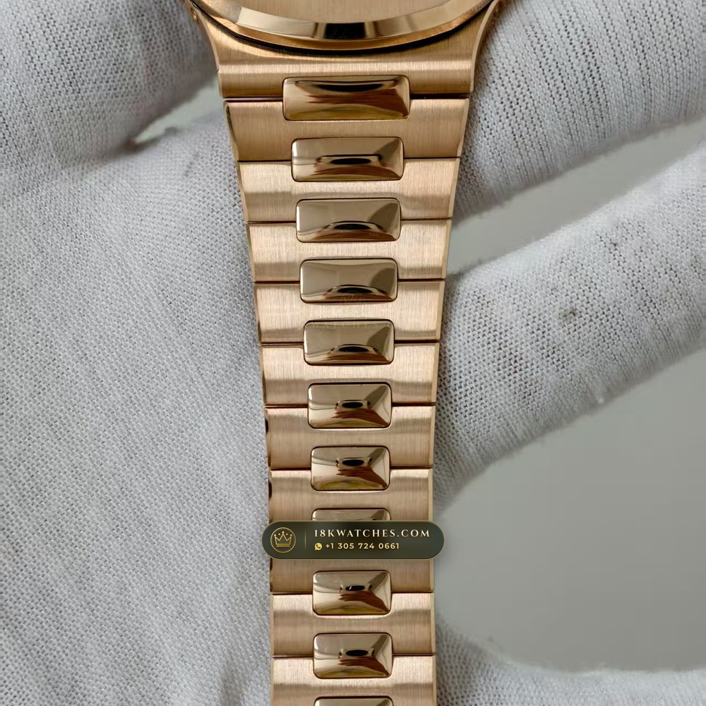 Patek Philippe Nautilus Moonphase & Power Reserve 18K Rose Gold Chronometer Regulated Spec Ref. 5712/1R-001 — Studio Gallery Plate IV in 18K Rose Gold Au750 (186.6g Verified Mass, Patek Philippe Cal. 240 PS IRM C LU - 22K Gold Micro-Rotor)