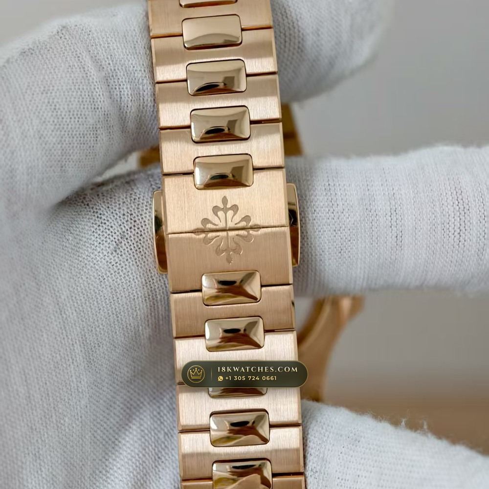 Patek Philippe Nautilus Moonphase & Power Reserve 18K Rose Gold Chronometer Regulated Spec Ref. 5712/1R-001 — Studio Gallery Plate VI in 18K Rose Gold Au750 (186.6g Verified Mass, Patek Philippe Cal. 240 PS IRM C LU - 22K Gold Micro-Rotor)