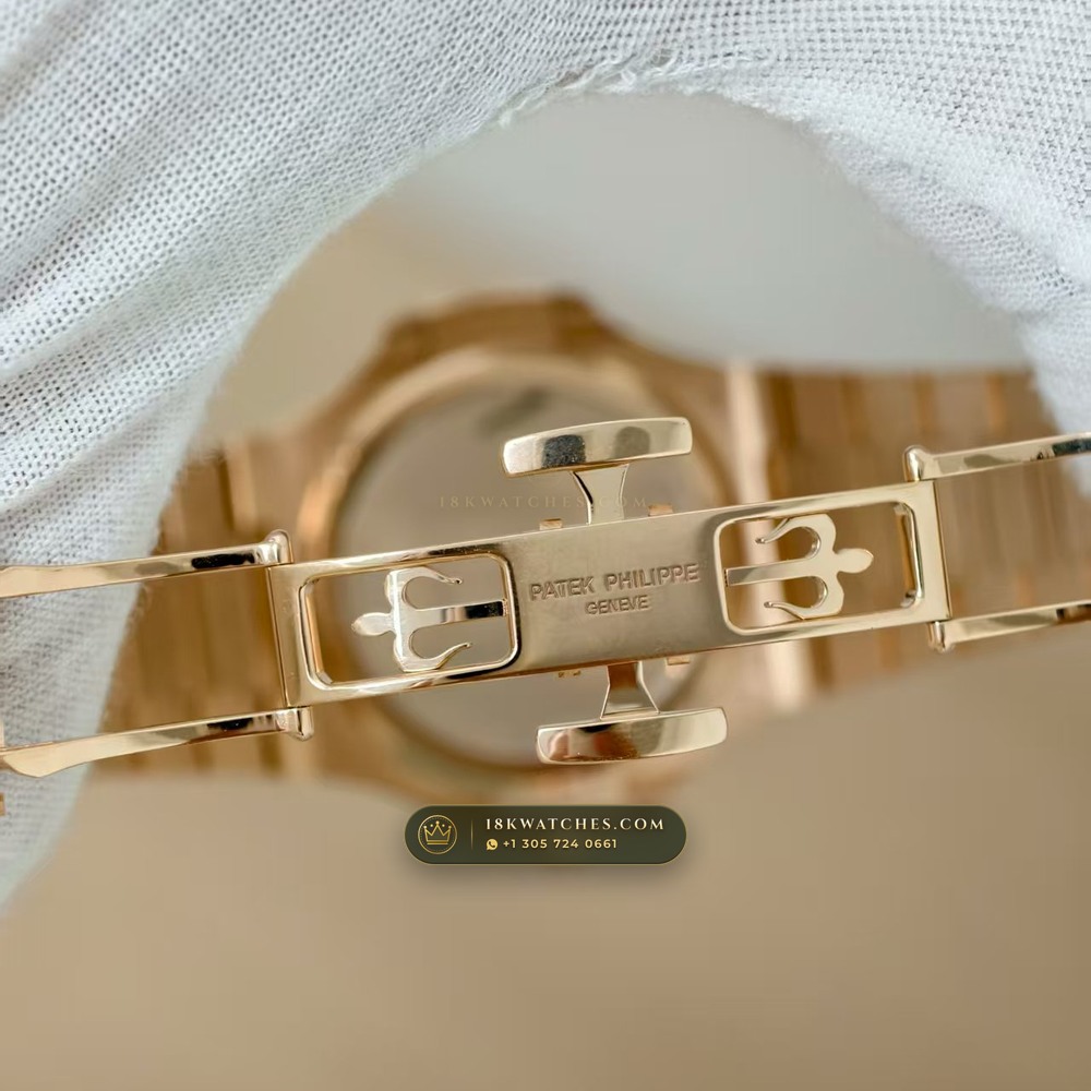 Patek Philippe Nautilus Moonphase & Power Reserve 18K Rose Gold Chronometer Regulated Spec Ref. 5712/1R-001 — Studio Gallery Plate VII in 18K Rose Gold Au750 (186.6g Verified Mass, Patek Philippe Cal. 240 PS IRM C LU - 22K Gold Micro-Rotor)