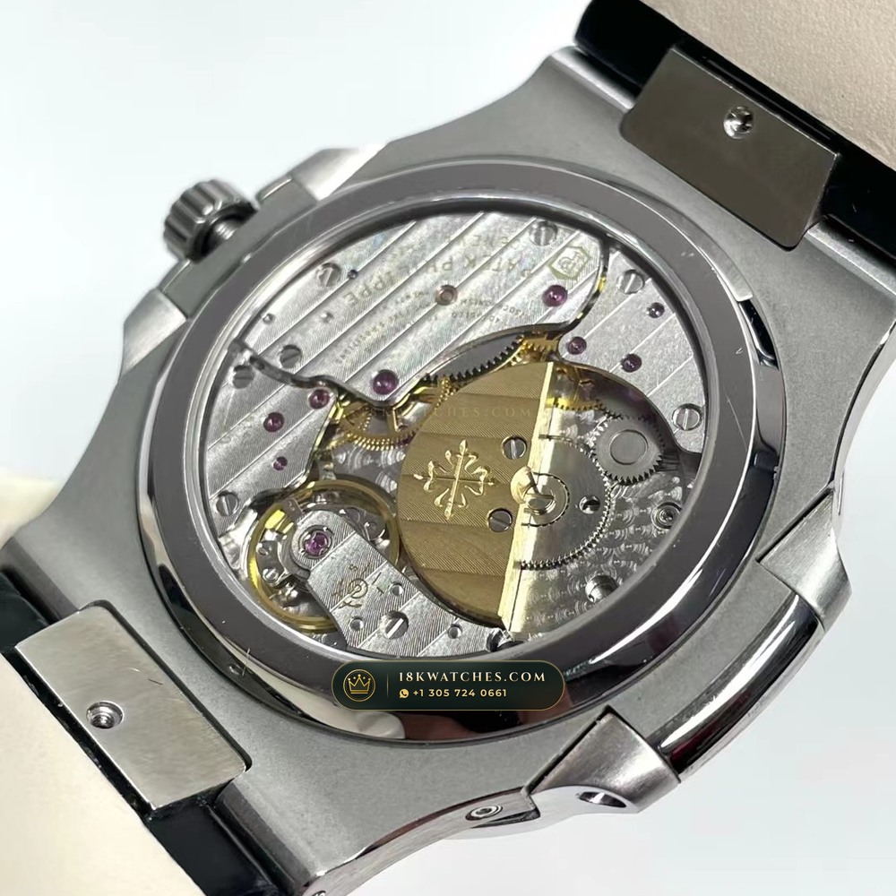 Patek Philippe Nautilus Moonphase & Power Reserve Graduated Royal Blue Sunburst Dial Ref. 5712A — Studio Gallery Plate VI in 904L Stainless Steel Custom Architecture (116.4g Verified Mass, Patek Philippe Cal. 240 PS IRM C LU - 22K Gold Micro-Rotor)
