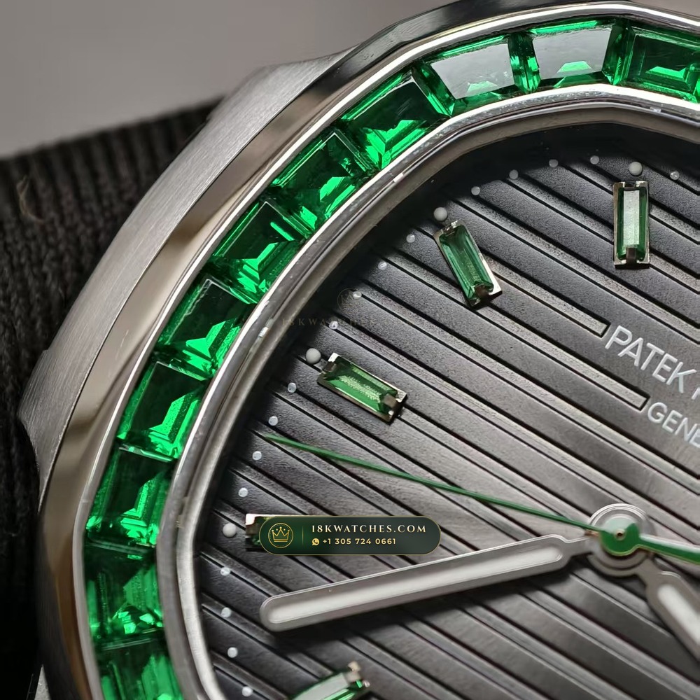 Patek Philippe Nautilus Self-Winding Baguette Emerald Bezel 950 Platinum 22K Gold Rotor Ref. 5711/113P-001 — Studio Gallery Plate IX in 950 Platinum Pt950 (244.9g Verified Mass, Patek Philippe Cal. 26-330 S C / Cal. 324 S C - 21K Gold Rotor)