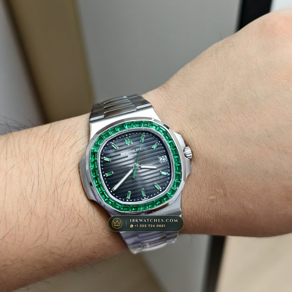 Patek Philippe Nautilus Self-Winding Baguette Emerald Bezel 950 Platinum 22K Gold Rotor Ref. 5711/113P-001 — Studio Gallery Plate XII in 950 Platinum Pt950 (244.9g Verified Mass, Patek Philippe Cal. 26-330 S C / Cal. 324 S C - 21K Gold Rotor)