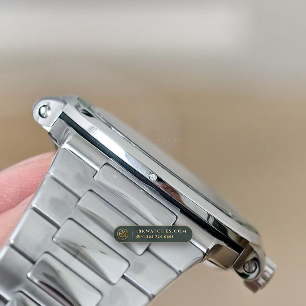 Patek Philippe Nautilus Self-Winding Baguette Emerald Bezel 950 Platinum 22K Gold Rotor Ref. 5711/113P-001 — Studio Gallery Plate XIII in 950 Platinum Pt950 (244.9g Verified Mass, Patek Philippe Cal. 26-330 S C / Cal. 324 S C - 21K Gold Rotor)