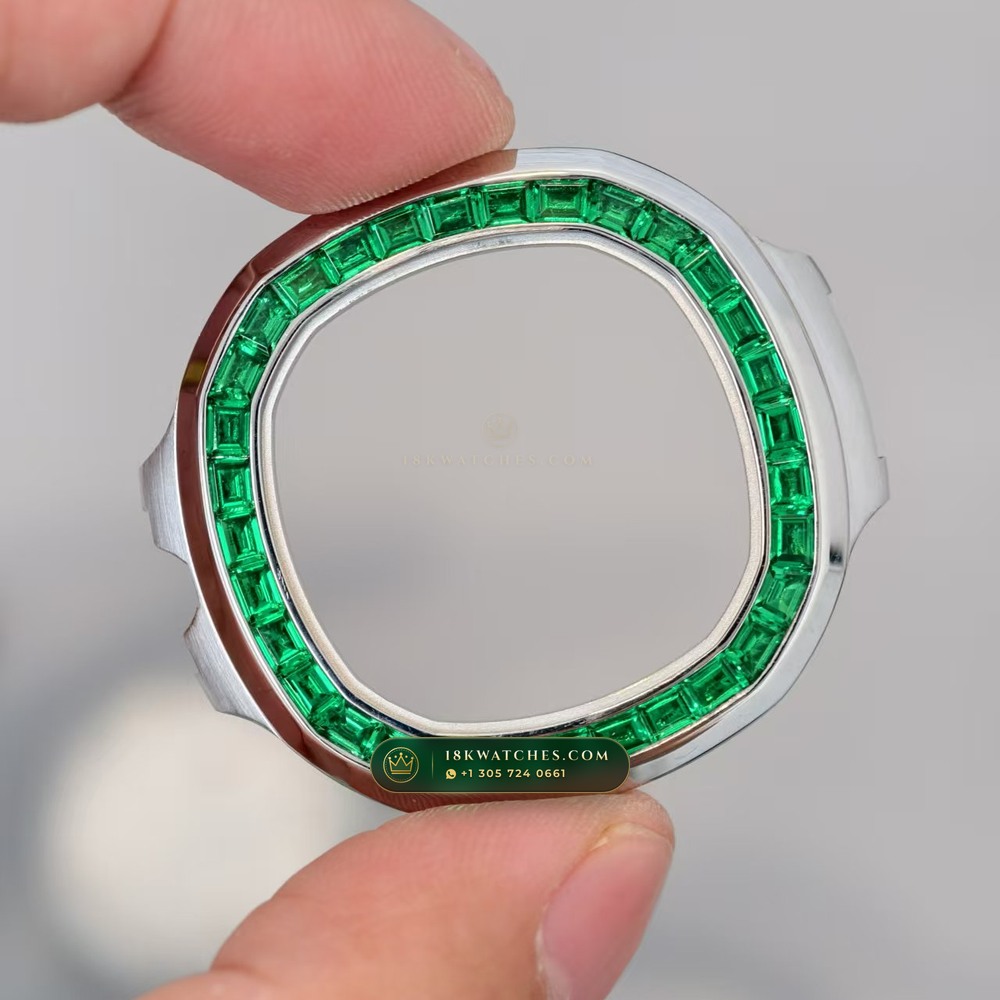 Patek Philippe Nautilus Self-Winding Baguette Emerald Bezel 950 Platinum 22K Gold Rotor Ref. 5711/113P-001