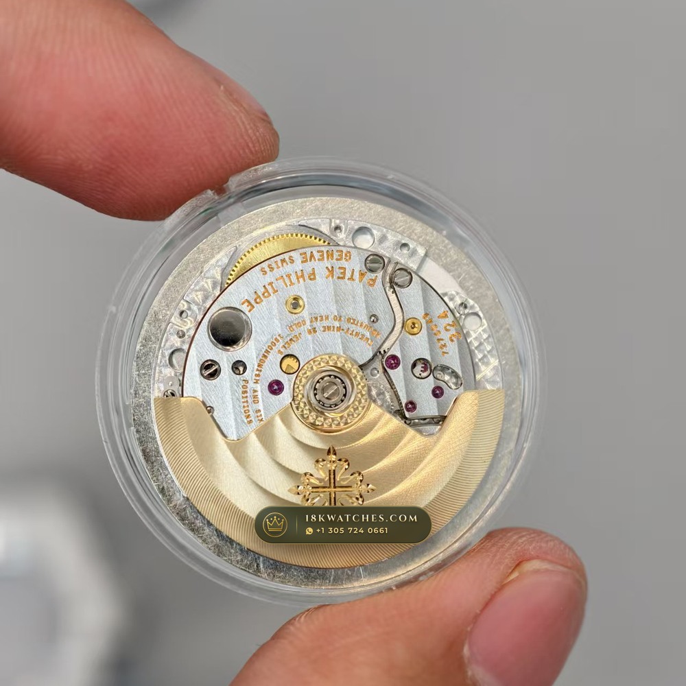 Patek Philippe Nautilus Self-Winding Baguette Emerald Bezel 950 Platinum 22K Gold Rotor Ref. 5711/113P-001 — Studio Gallery Plate II in 950 Platinum Pt950 (244.9g Verified Mass, Patek Philippe Cal. 26-330 S C / Cal. 324 S C - 21K Gold Rotor)