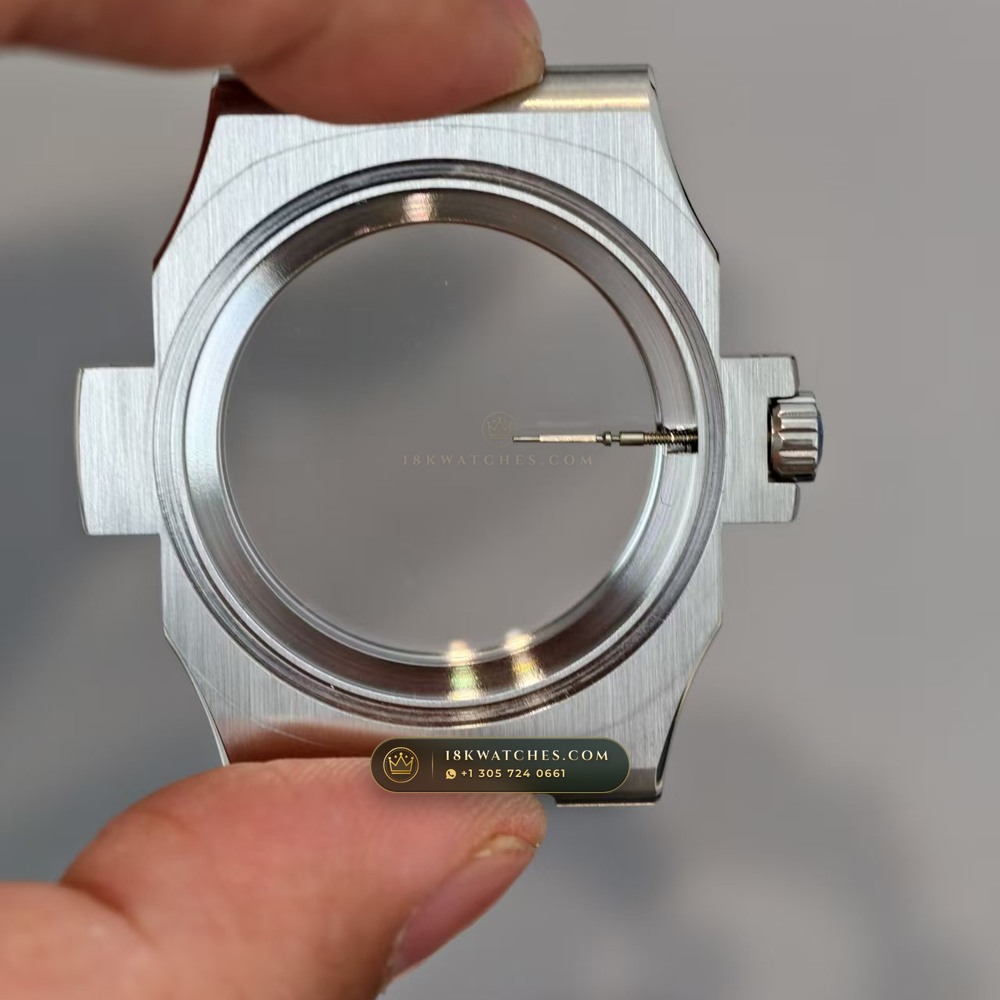 Patek Philippe Nautilus Self-Winding Baguette Emerald Bezel 950 Platinum 22K Gold Rotor Ref. 5711/113P-001 — Studio Gallery Plate III in 950 Platinum Pt950 (244.9g Verified Mass, Patek Philippe Cal. 26-330 S C / Cal. 324 S C - 21K Gold Rotor)