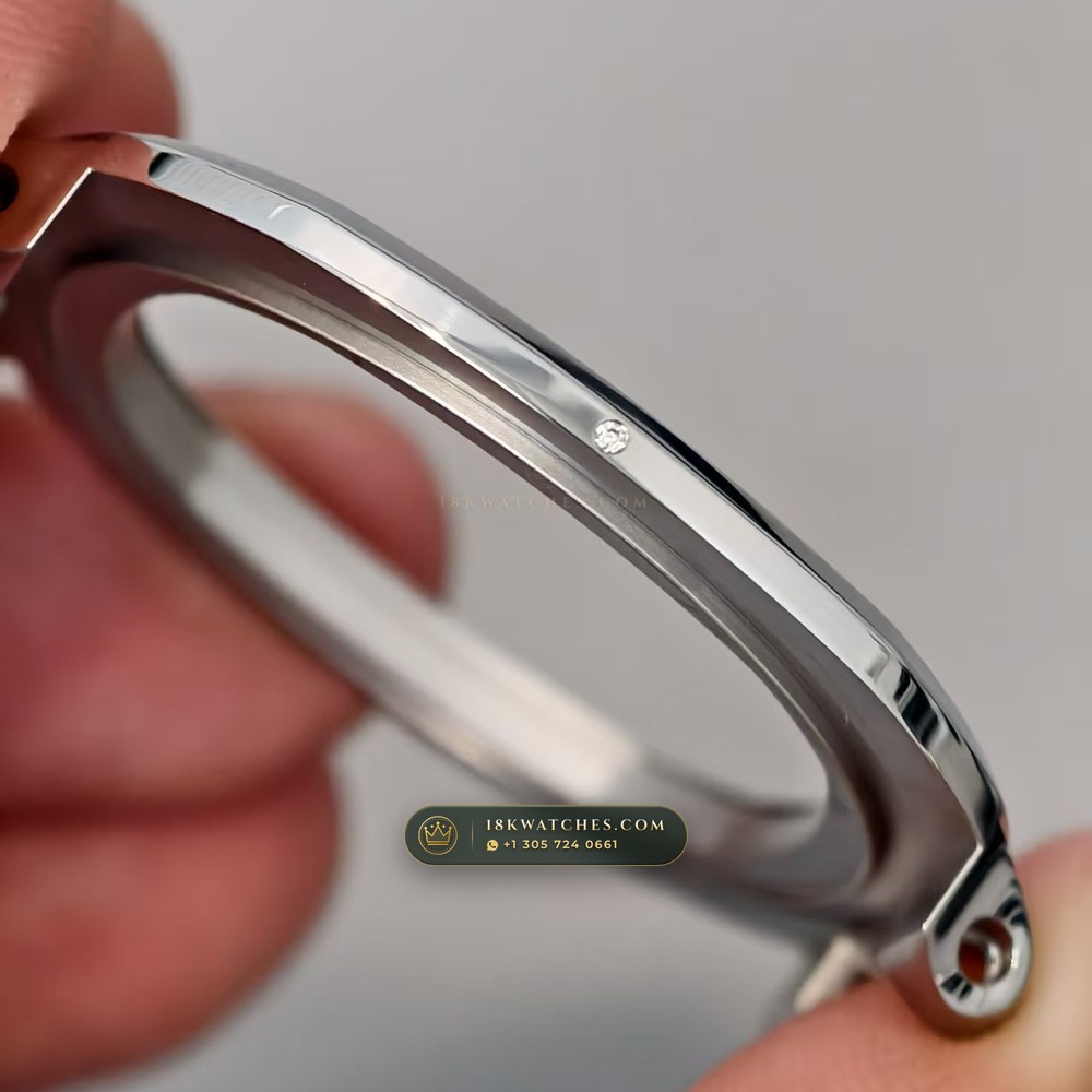 Patek Philippe Nautilus Self-Winding Baguette Emerald Bezel 950 Platinum 22K Gold Rotor Ref. 5711/113P-001 — Studio Gallery Plate IV in 950 Platinum Pt950 (244.9g Verified Mass, Patek Philippe Cal. 26-330 S C / Cal. 324 S C - 21K Gold Rotor)