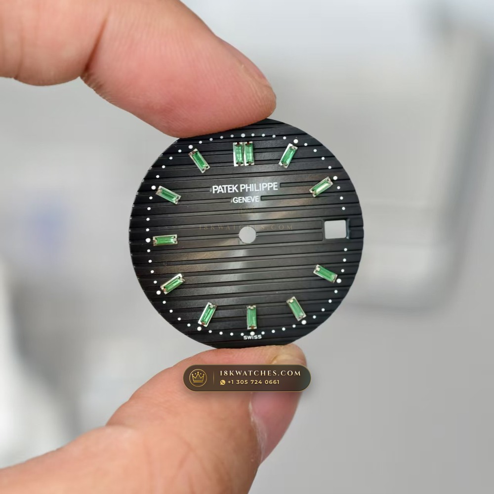 Patek Philippe Nautilus Self-Winding Baguette Emerald Bezel 950 Platinum 22K Gold Rotor Ref. 5711/113P-001 — Studio Gallery Plate V in 950 Platinum Pt950 (244.9g Verified Mass, Patek Philippe Cal. 26-330 S C / Cal. 324 S C - 21K Gold Rotor)