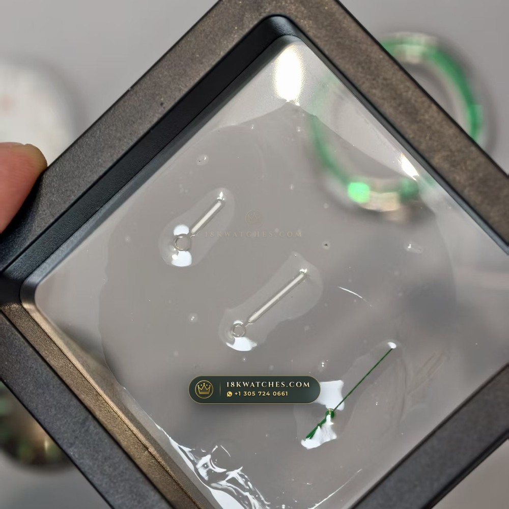 Patek Philippe Nautilus Self-Winding Baguette Emerald Bezel 950 Platinum 22K Gold Rotor Ref. 5711/113P-001 — Studio Gallery Plate VII in 950 Platinum Pt950 (244.9g Verified Mass, Patek Philippe Cal. 26-330 S C / Cal. 324 S C - 21K Gold Rotor)
