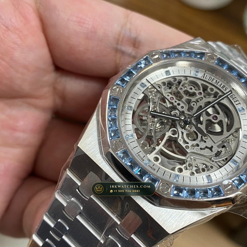 Audemars Piguet Royal Oak Double Balance Wheel Openworked 41mm Baguette Blue Topaz Bezel 18K White Gold Geneva Atelier Spec Ref. 15412BC.TO.1220BC.01 — Studio Gallery Plate IV in 18K White Gold Au750 (224.1g Verified Mass, Audemars Piguet Cal. 3132 Dual-Balance Openworked)
