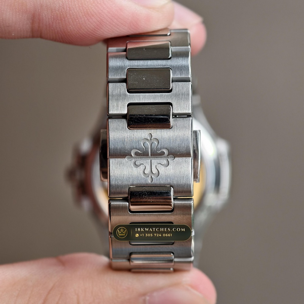 Patek Philippe Nautilus Ladies Automatic Diamond-Set Bezel Ref. 7118/1200A-011 — Studio Gallery Plate VII in 904L Stainless Steel Custom Architecture (96.4g Verified Mass, Patek Philippe Cal. 324 S C - 21K Gold Rotor)