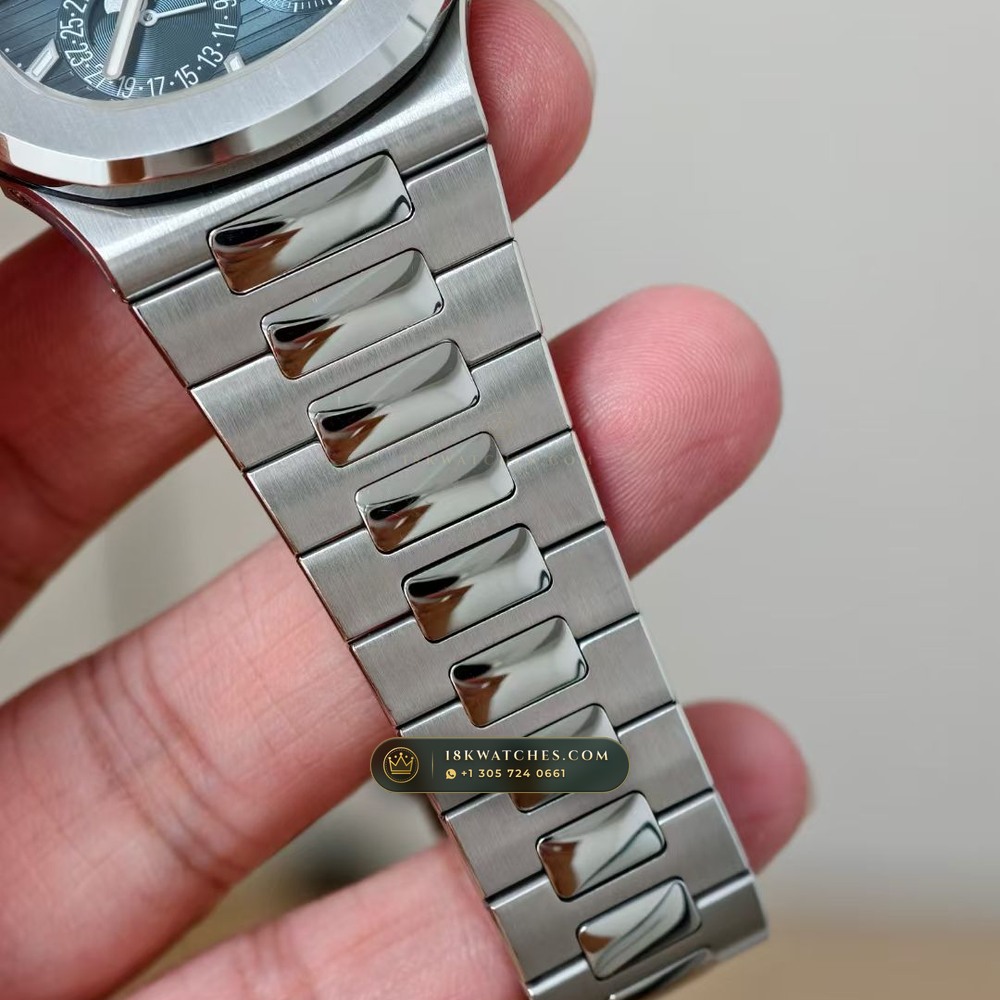 Patek Philippe Nautilus Moonphase & Power Reserve Chronometer Regulated Spec Ref. 5712A — Studio Gallery Plate IV in 904L Stainless Steel Custom Architecture (116.8g Verified Mass, Patek Philippe Cal. 240 PS IRM C LU - 22K Gold Micro-Rotor)