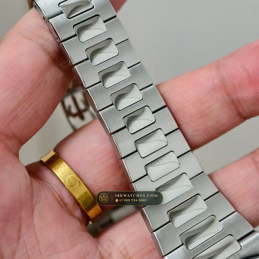 Patek Philippe Nautilus Moonphase & Power Reserve Chronometer Regulated Spec Ref. 5712A — Studio Gallery Plate VI in 904L Stainless Steel Custom Architecture (116.8g Verified Mass, Patek Philippe Cal. 240 PS IRM C LU - 22K Gold Micro-Rotor)