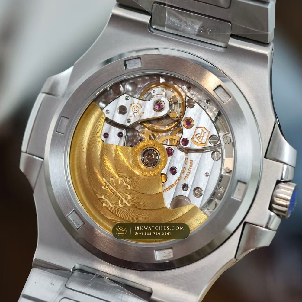 Patek Philippe Nautilus Self-Winding Monte-Carlo Showroom Spec Ref. 5711A — Studio Gallery Plate VI in 904L Stainless Steel Custom Architecture (115.0g Verified Mass, Patek Philippe Cal. 26-330 S C / Cal. 324 S C - 21K Gold Rotor)