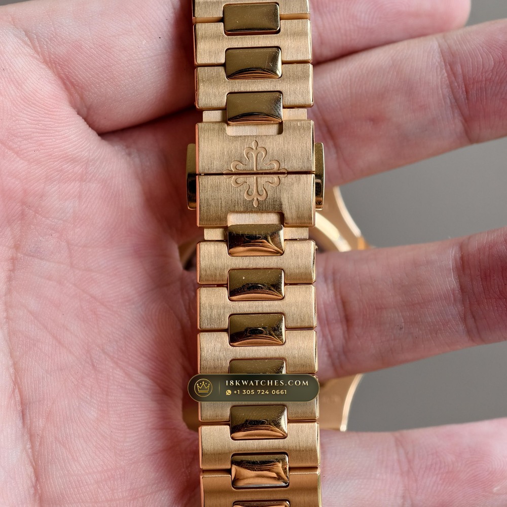 Patek Philippe Nautilus Moonphase & Power Reserve 18K Rose Gold Ref. 5712/1R-001 — Studio Gallery Plate X in 18K Rose Gold Au750 (186.2g Verified Mass, Patek Philippe Cal. 240 PS IRM C LU - 22K Gold Micro-Rotor)