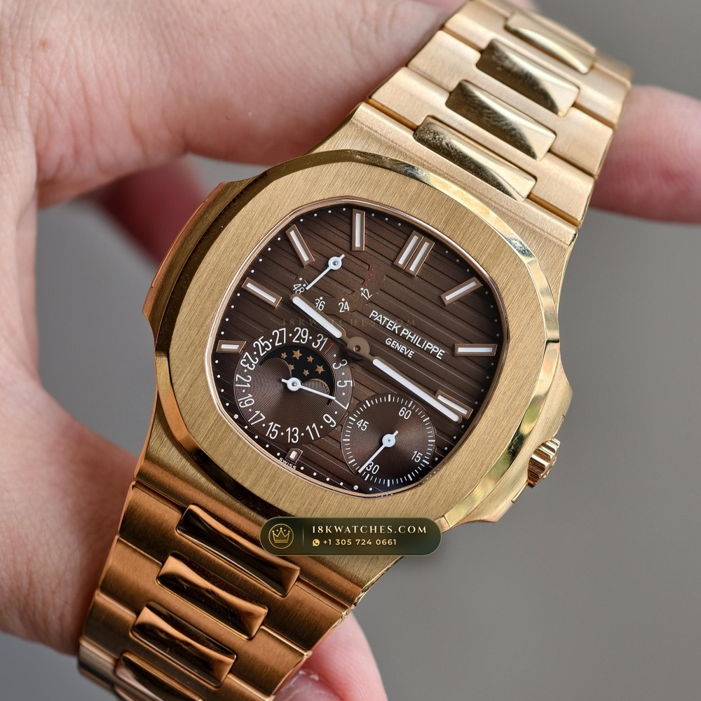 Patek Philippe Nautilus Moonphase & Power Reserve 18K Rose Gold Ref. 5712/1R-001 — Studio Gallery Plate III in 18K Rose Gold Au750 (186.2g Verified Mass, Patek Philippe Cal. 240 PS IRM C LU - 22K Gold Micro-Rotor)