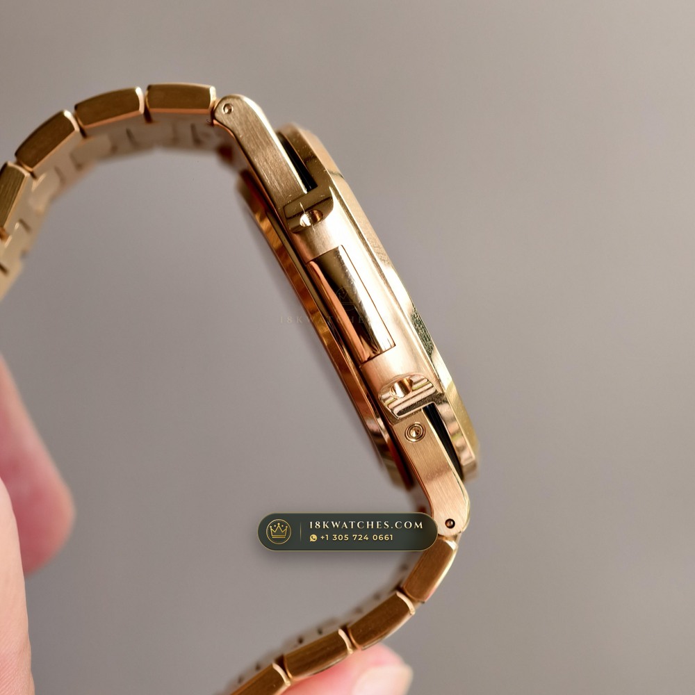 Patek Philippe Nautilus Moonphase & Power Reserve 18K Rose Gold Ref. 5712/1R-001 — Studio Gallery Plate VI in 18K Rose Gold Au750 (186.2g Verified Mass, Patek Philippe Cal. 240 PS IRM C LU - 22K Gold Micro-Rotor)