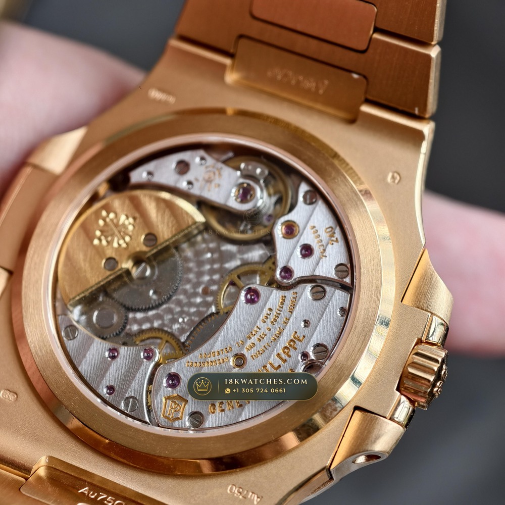 Patek Philippe Nautilus Moonphase & Power Reserve 18K Rose Gold Ref. 5712/1R-001 — Studio Gallery Plate VII in 18K Rose Gold Au750 (186.2g Verified Mass, Patek Philippe Cal. 240 PS IRM C LU - 22K Gold Micro-Rotor)