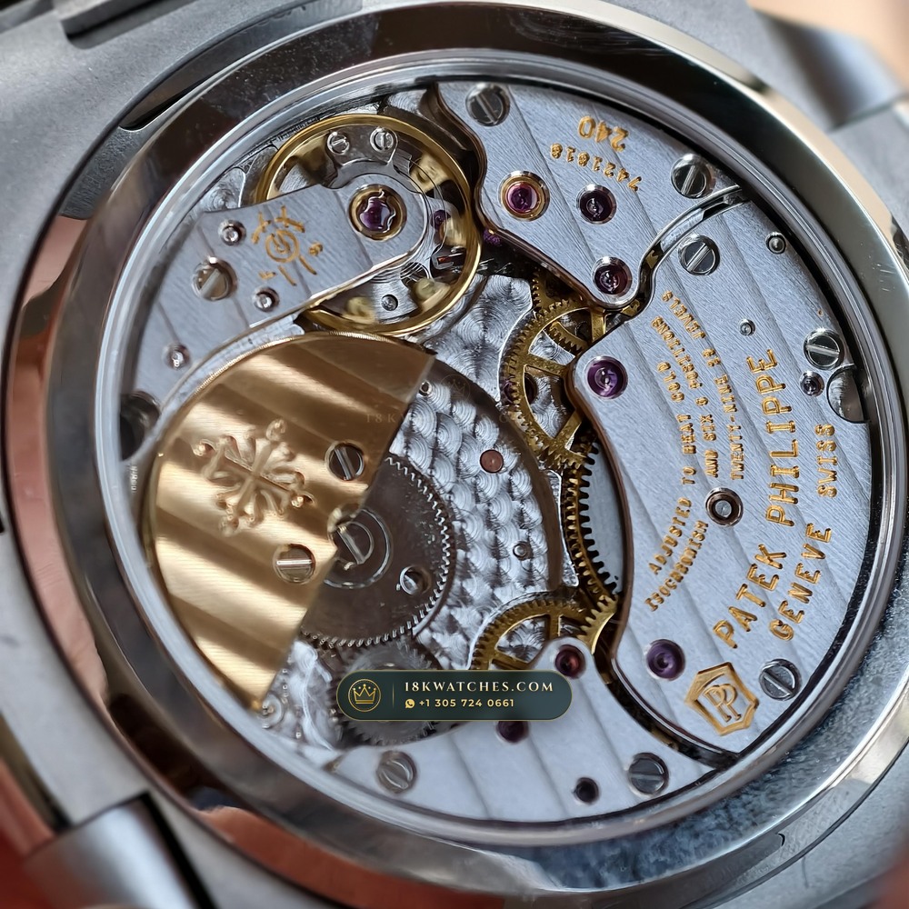 Patek Philippe Nautilus Moonphase & Power Reserve Custom SW Dial 22K Gold Rotor Ref. 5712/1A — Studio Gallery Plate VI in 904L Stainless Steel Custom Architecture (116.9g Verified Mass, Patek Philippe Cal. 240 PS IRM C LU - 22K Gold Micro-Rotor)